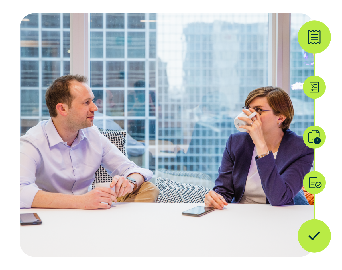 employees discussing expense management software