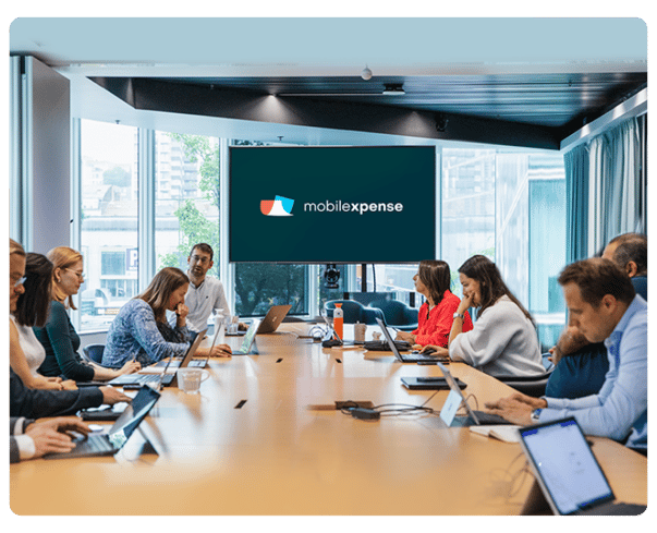 People sitting around a board room table