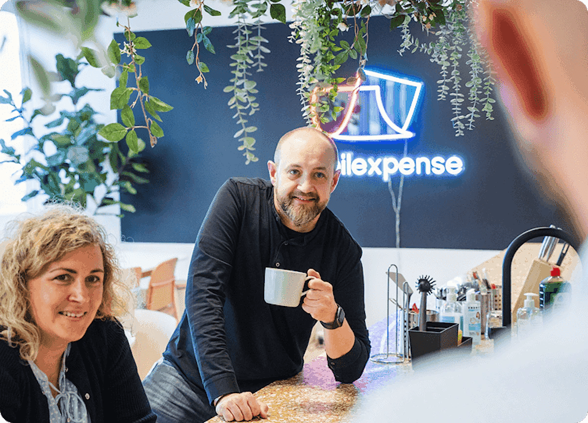 Man and woman at counter with coffee